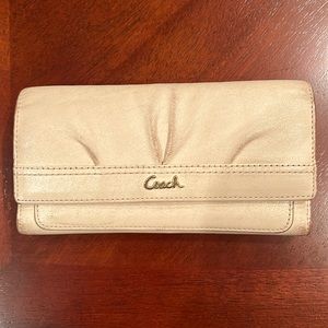 Authentic Coach cream wallet with snap closure